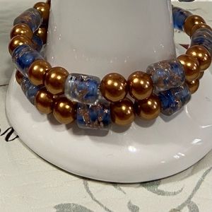 Handmade women blue and bronze acrylic glass beads memory wire bracelet. NWOT.